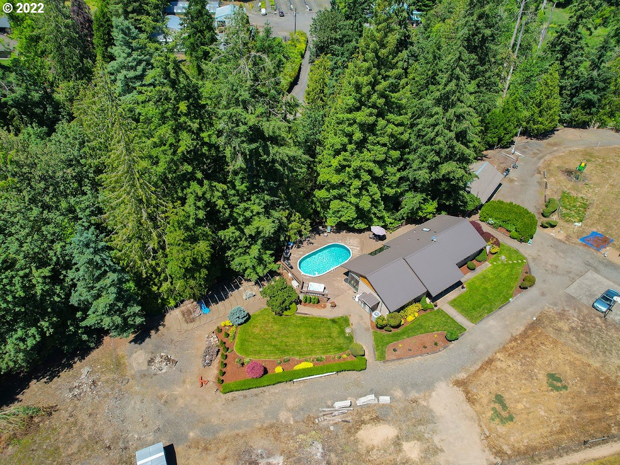 6562 South Zimmerman Road Aurora, OR 97002 - Photo 8 of 31 an aerial view of a house with a yard