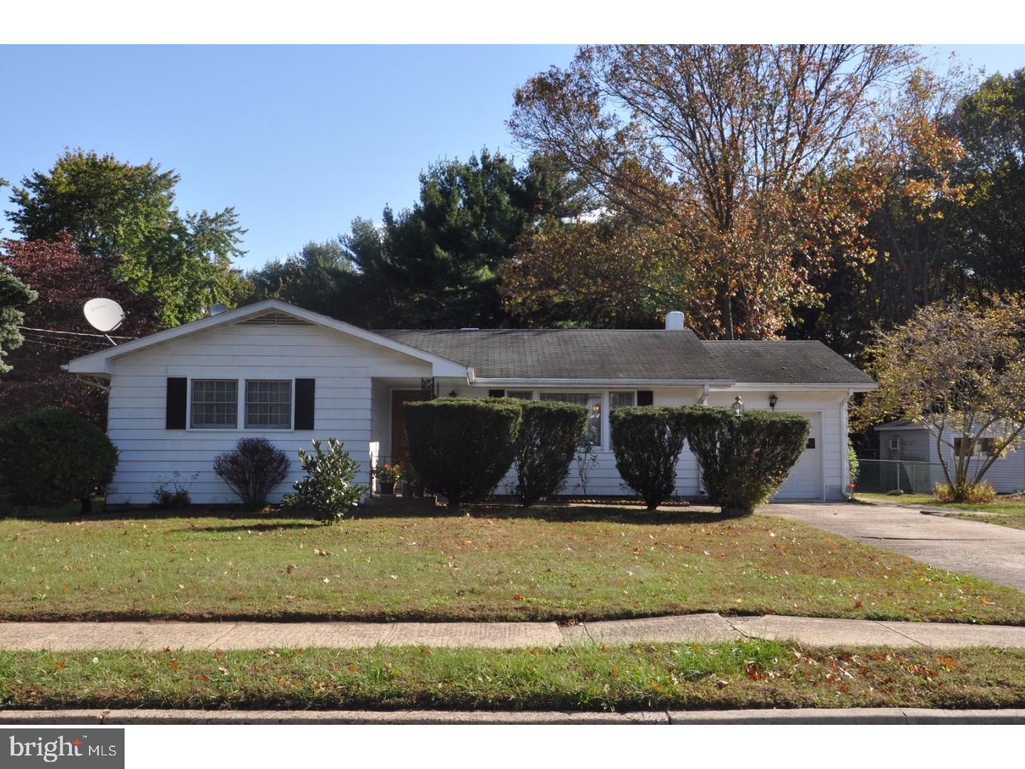 472 Station Road Roebling, NJ 08554 - Photo 1 of 25 a front view of a house with a yard