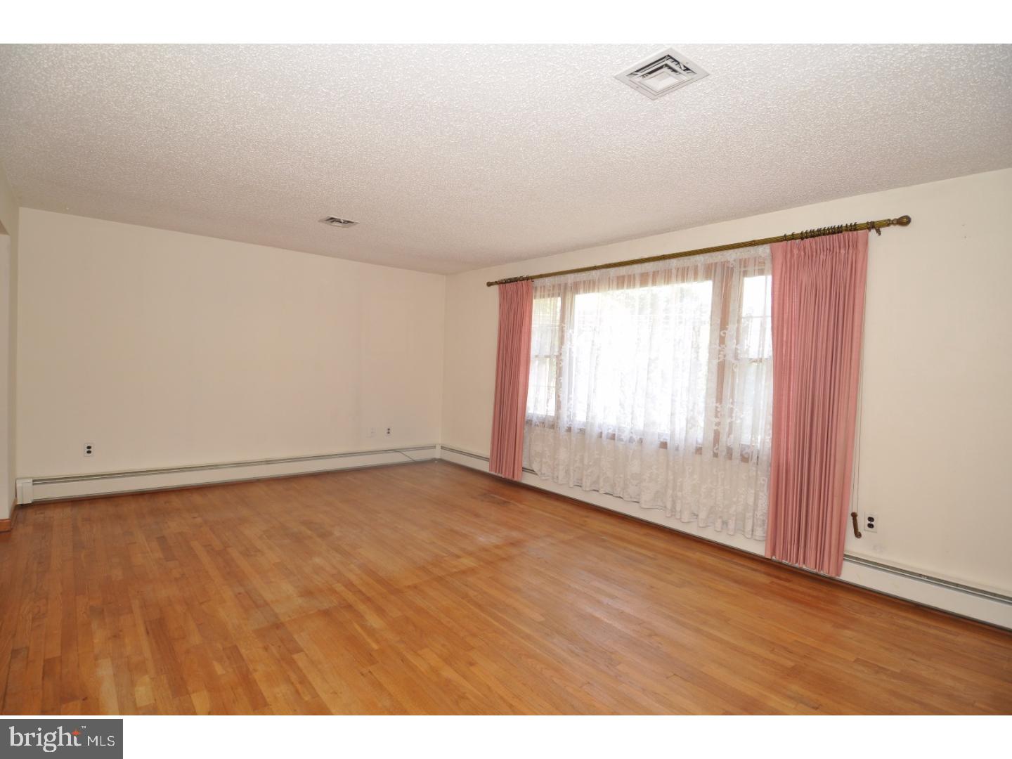 472 Station Road Roebling, NJ 08554 - Photo 2 of 25 a view of an empty room with a window