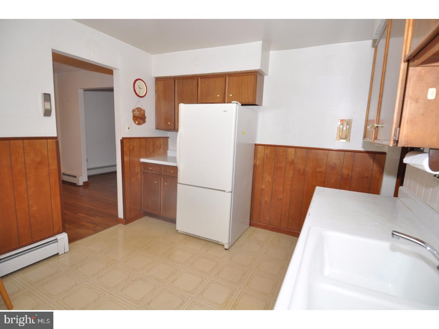 472 Station Road Roebling, NJ 08554 - Photo 6 of 25 a utility room with refrigerator and stove