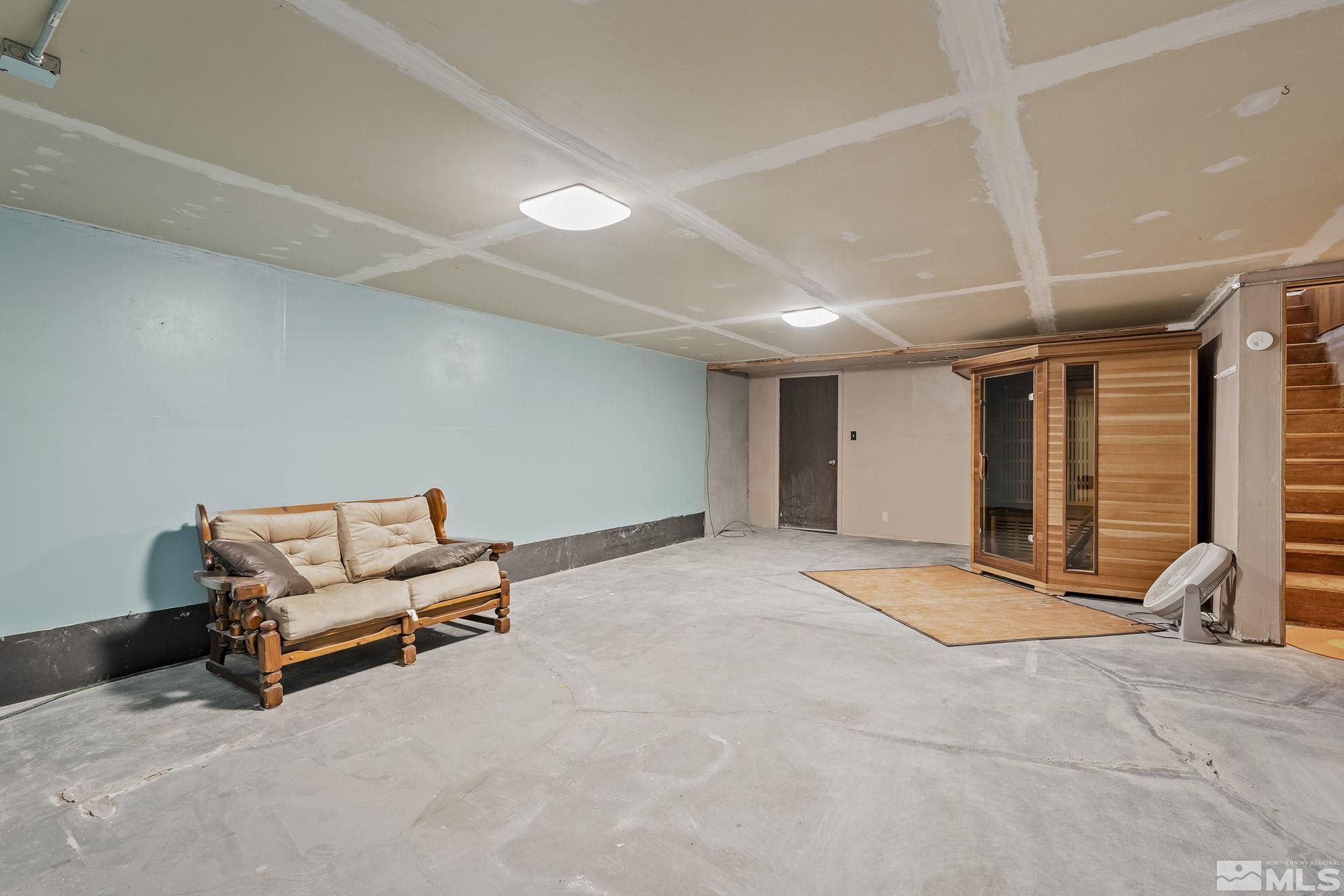 2 Lida Circle Carson City, NV 89706 - Photo 25 of 40 a living room with furniture a ceiling fan and a rug