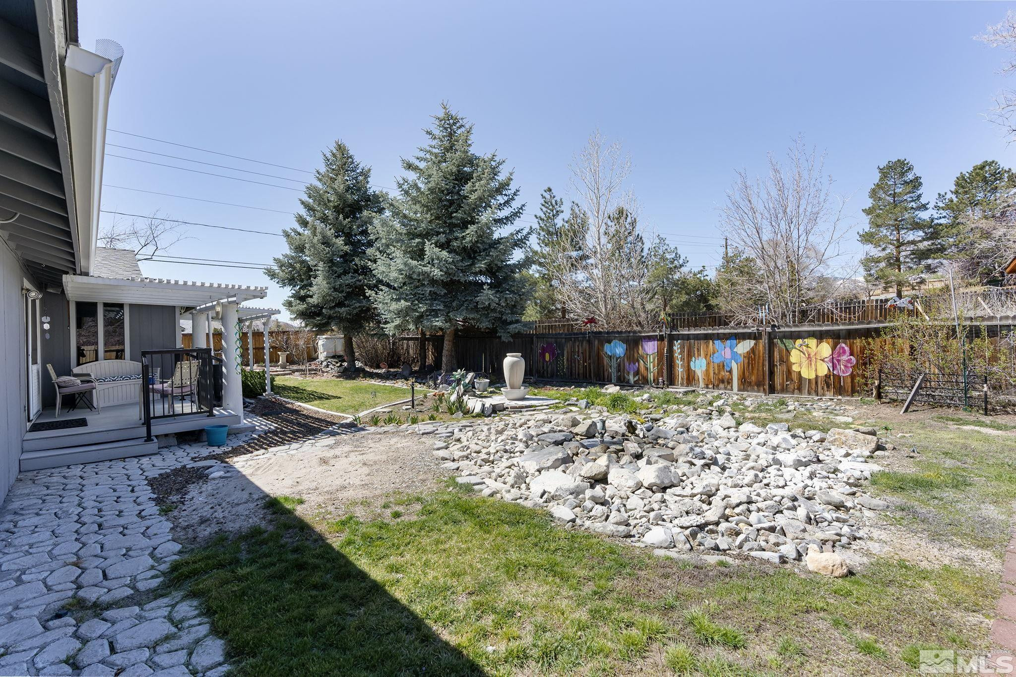 2 Lida Circle Carson City, NV 89706 - Photo 31 of 40 a front view of a house with a yard