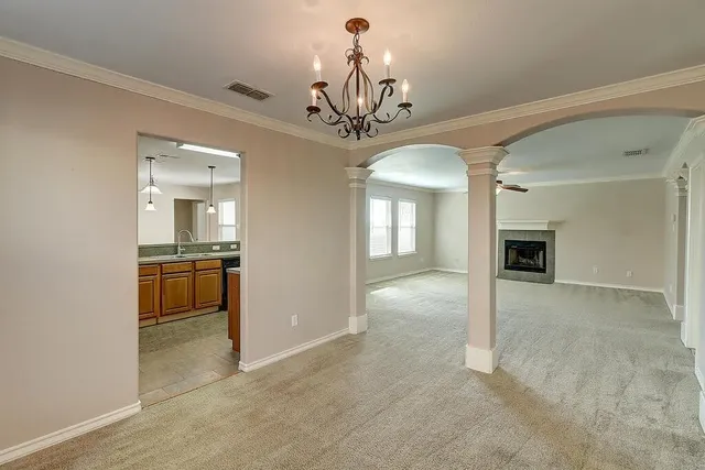 a view of a chandelier in a kitchen