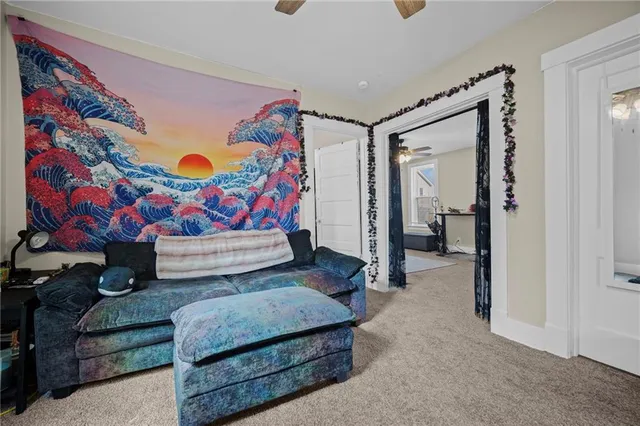 a living room with furniture and a couch