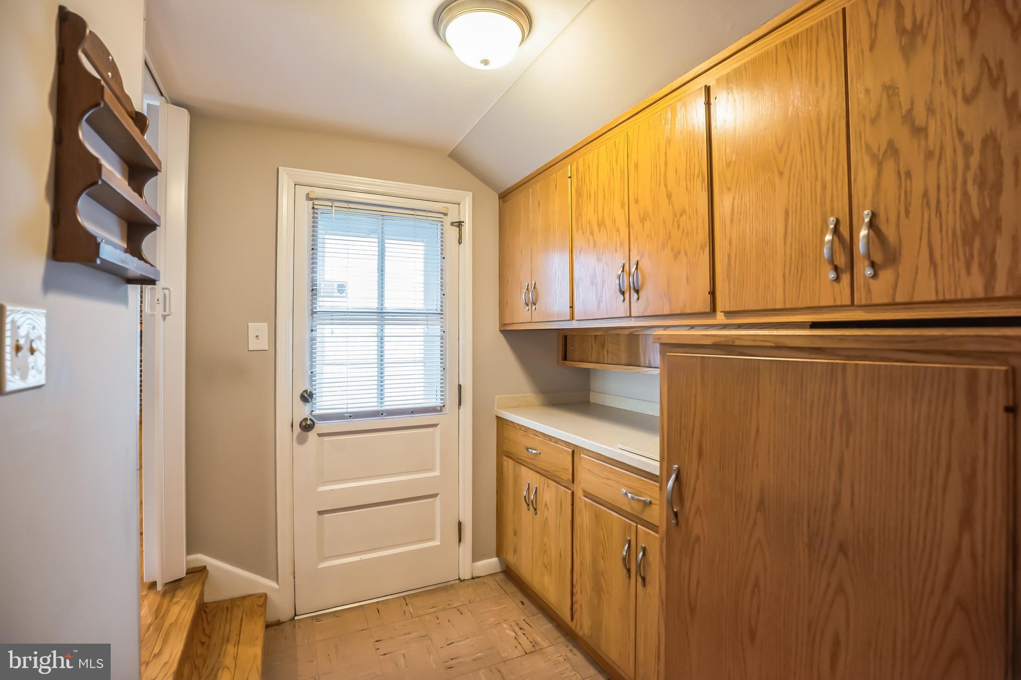 121 Rockingham Road Cherry Hill, NJ 08034 - Photo 16 of 33 a kitchen with a window and cabinets