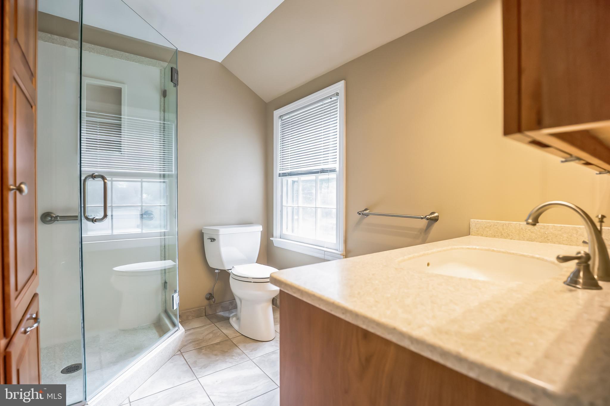 121 Rockingham Road Cherry Hill, NJ 08034 - Photo 23 of 33 a bathroom with a sink toilet and shower