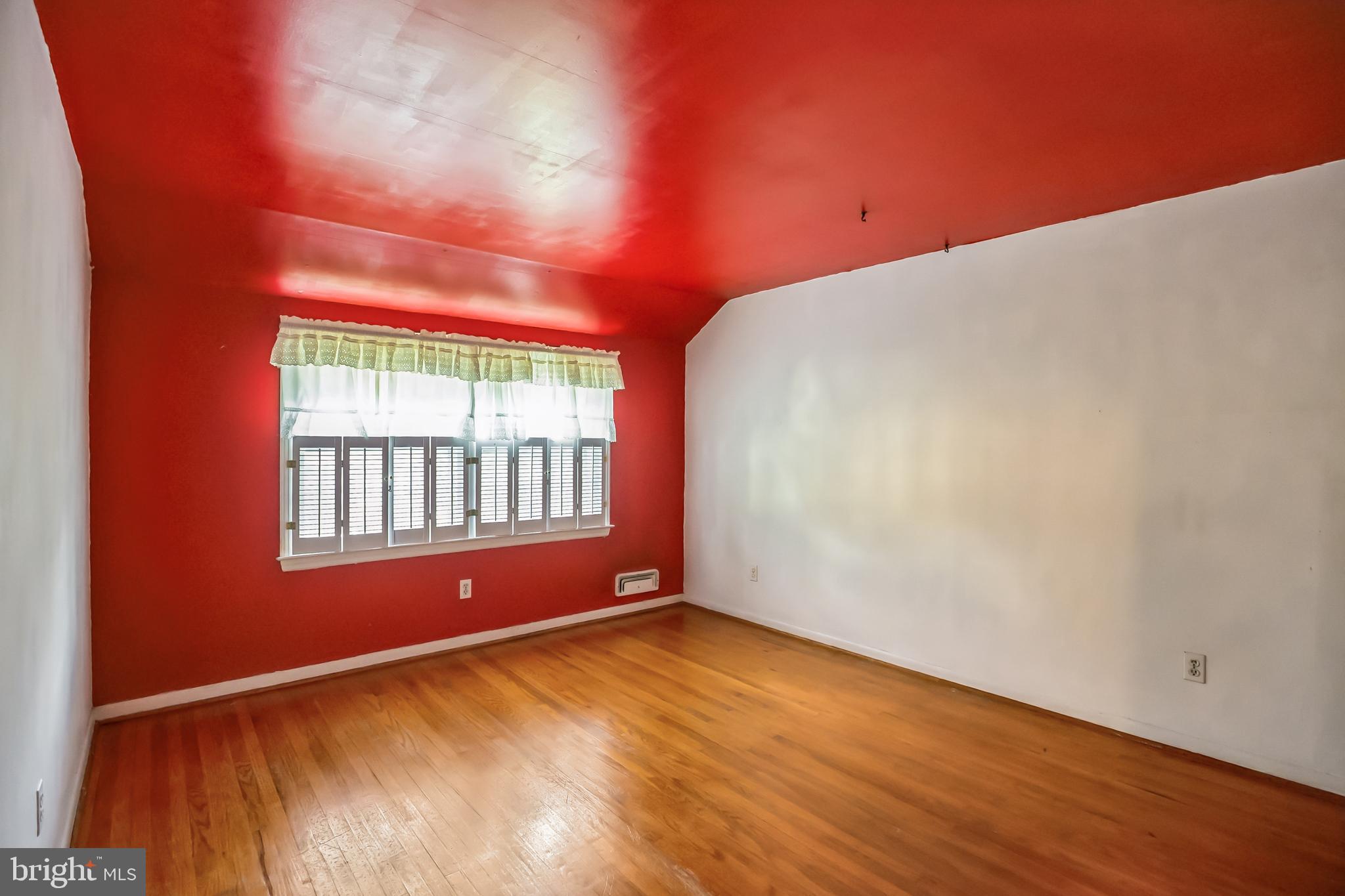 121 Rockingham Road Cherry Hill, NJ 08034 - Photo 24 of 33 a view of empty room with wooden floor and fan