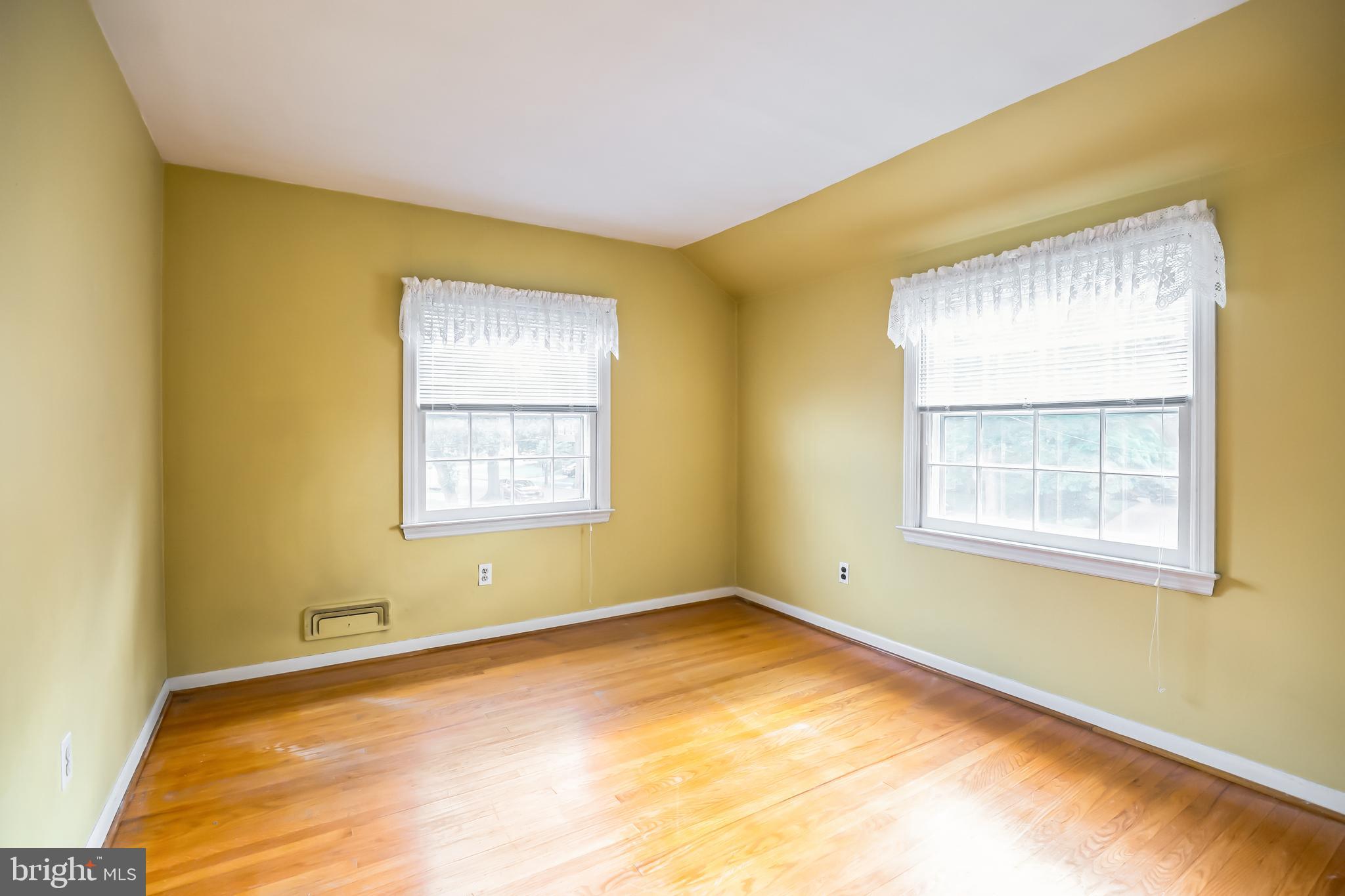 121 Rockingham Road Cherry Hill, NJ 08034 - Photo 25 of 33 a view of an empty room with a window