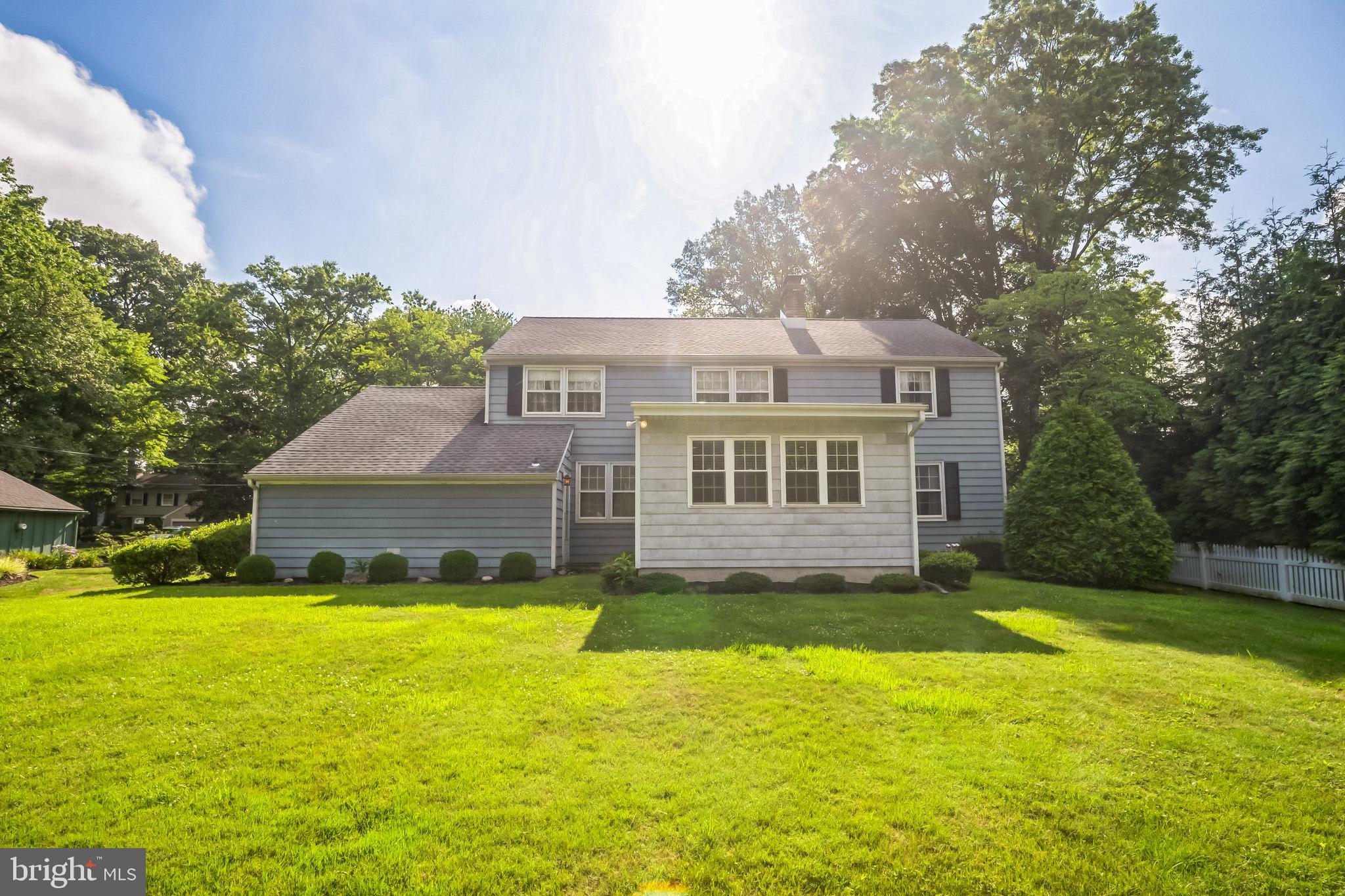 121 Rockingham Road Cherry Hill, NJ 08034 - Photo 3 of 33 a front view of house with yard and swimming pool