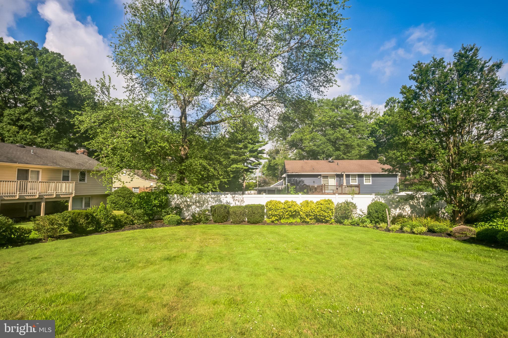 121 Rockingham Road Cherry Hill, NJ 08034 - Photo 4 of 33 a view of a house with a big yard