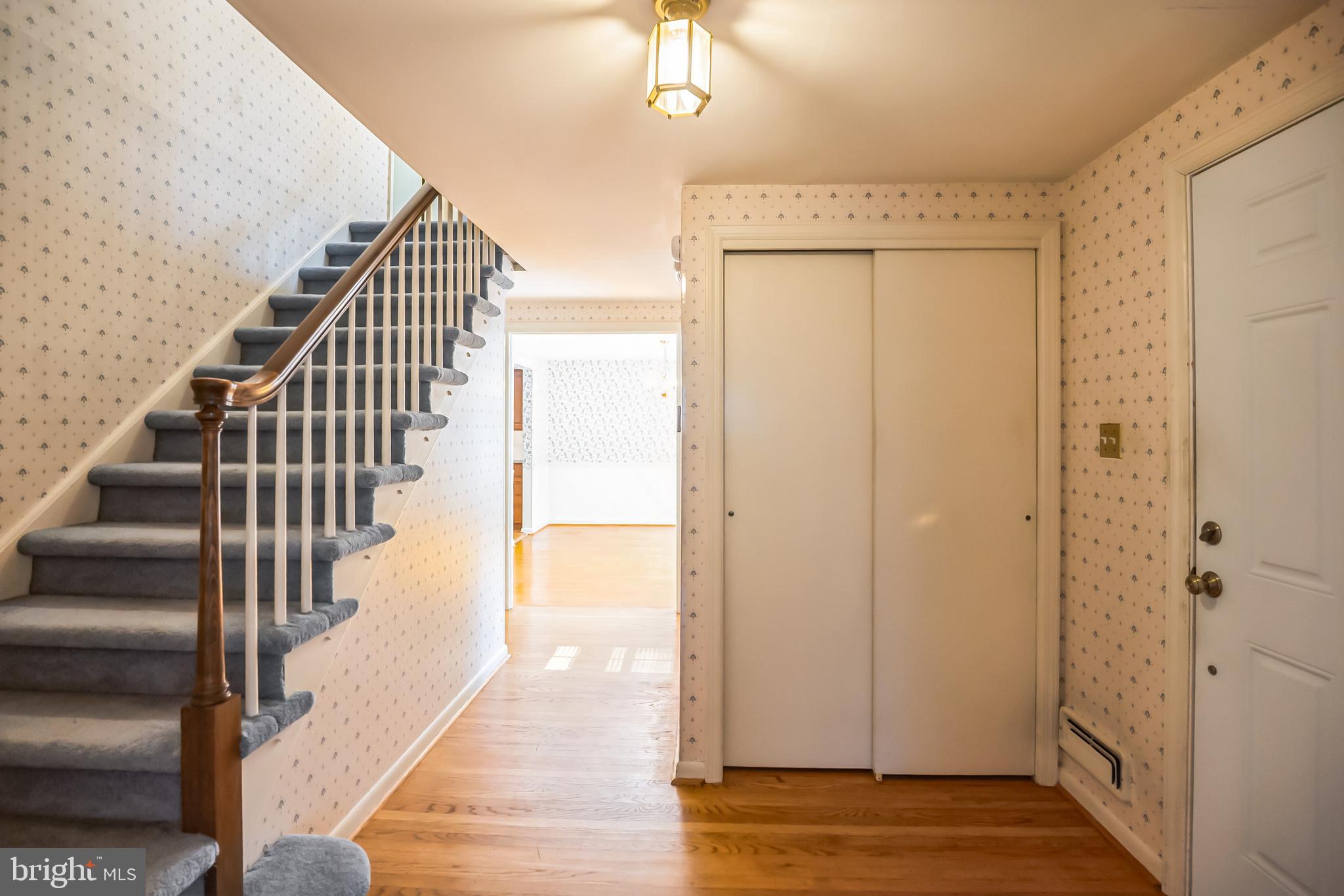 121 Rockingham Road Cherry Hill, NJ 08034 - Photo 8 of 33 a view of entryway with wooden floor