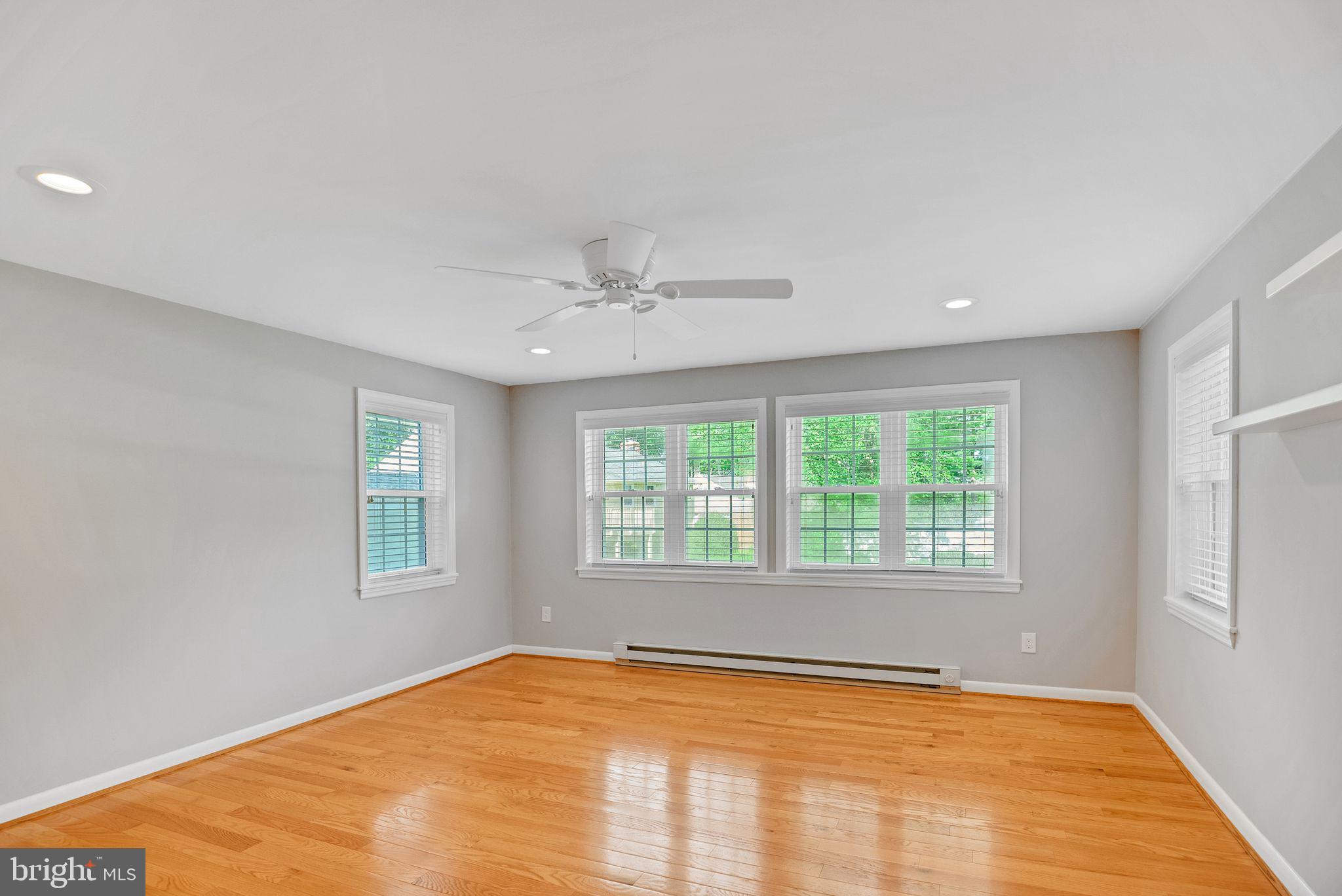121 Rockingham Road Cherry Hill, NJ 08034 - Photo 10 of 33 a view of an empty room with a window