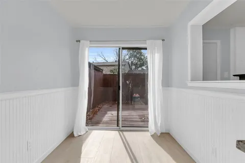 a view of a room with a large window