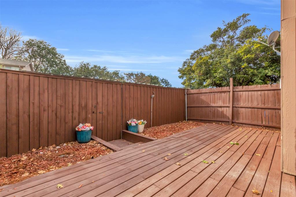 7610 Highmont Street Dallas, TX 75230 - Photo 19 of 37 a view of a backyard