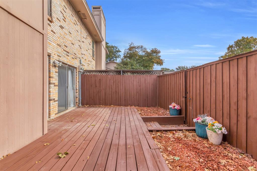 7610 Highmont Street Dallas, TX 75230 - Photo 20 of 37 a backyard of a house