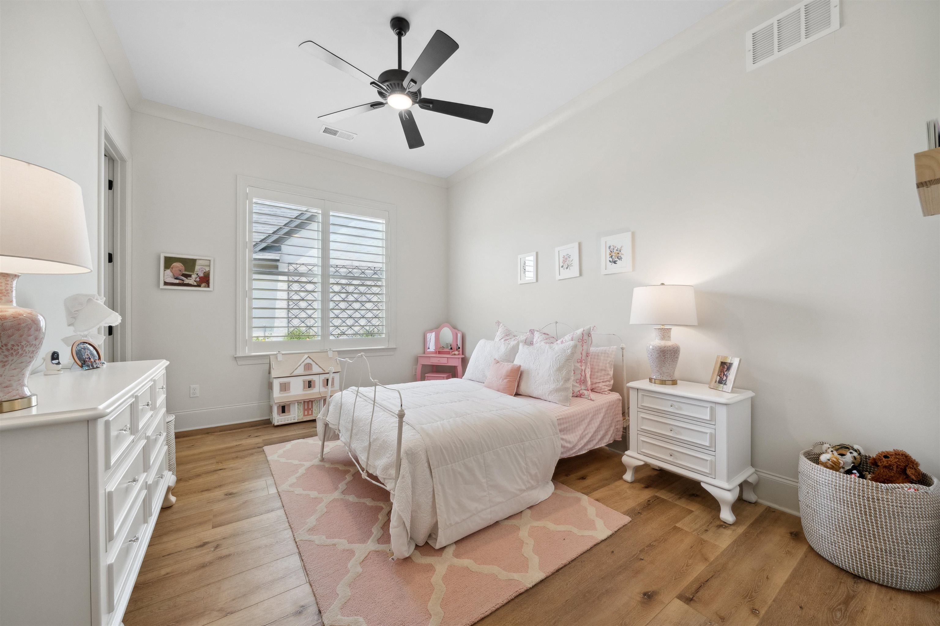 220 Mary Taylor Way Piperton, TN 38017 - Photo 22 of 36 Bedroom with light wood-style floors, crown molding, and a ceiling fan