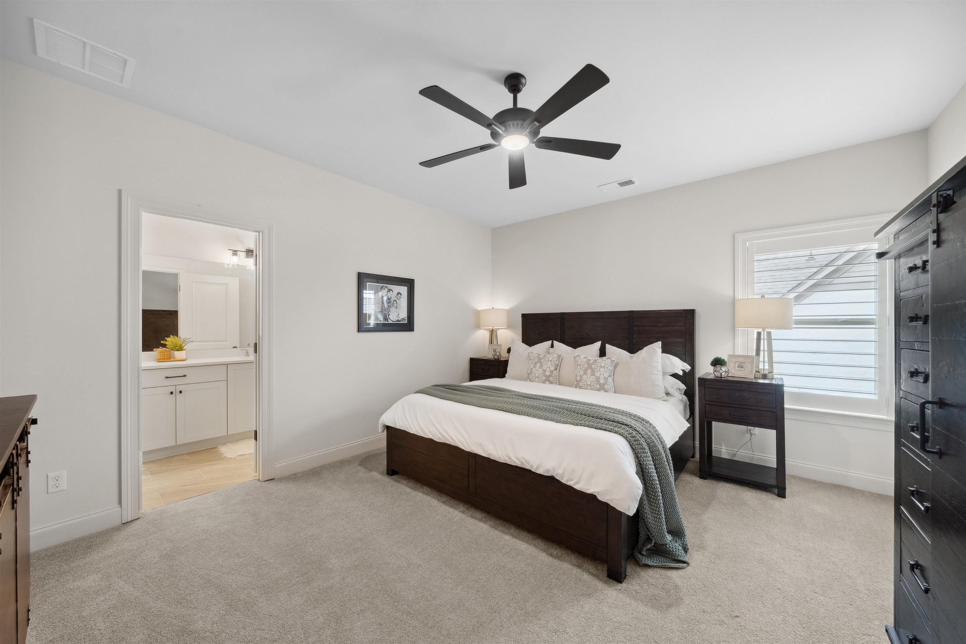 220 Mary Taylor Way Piperton, TN 38017 - Photo 24 of 36 Bedroom with light colored carpet and ceiling fan
