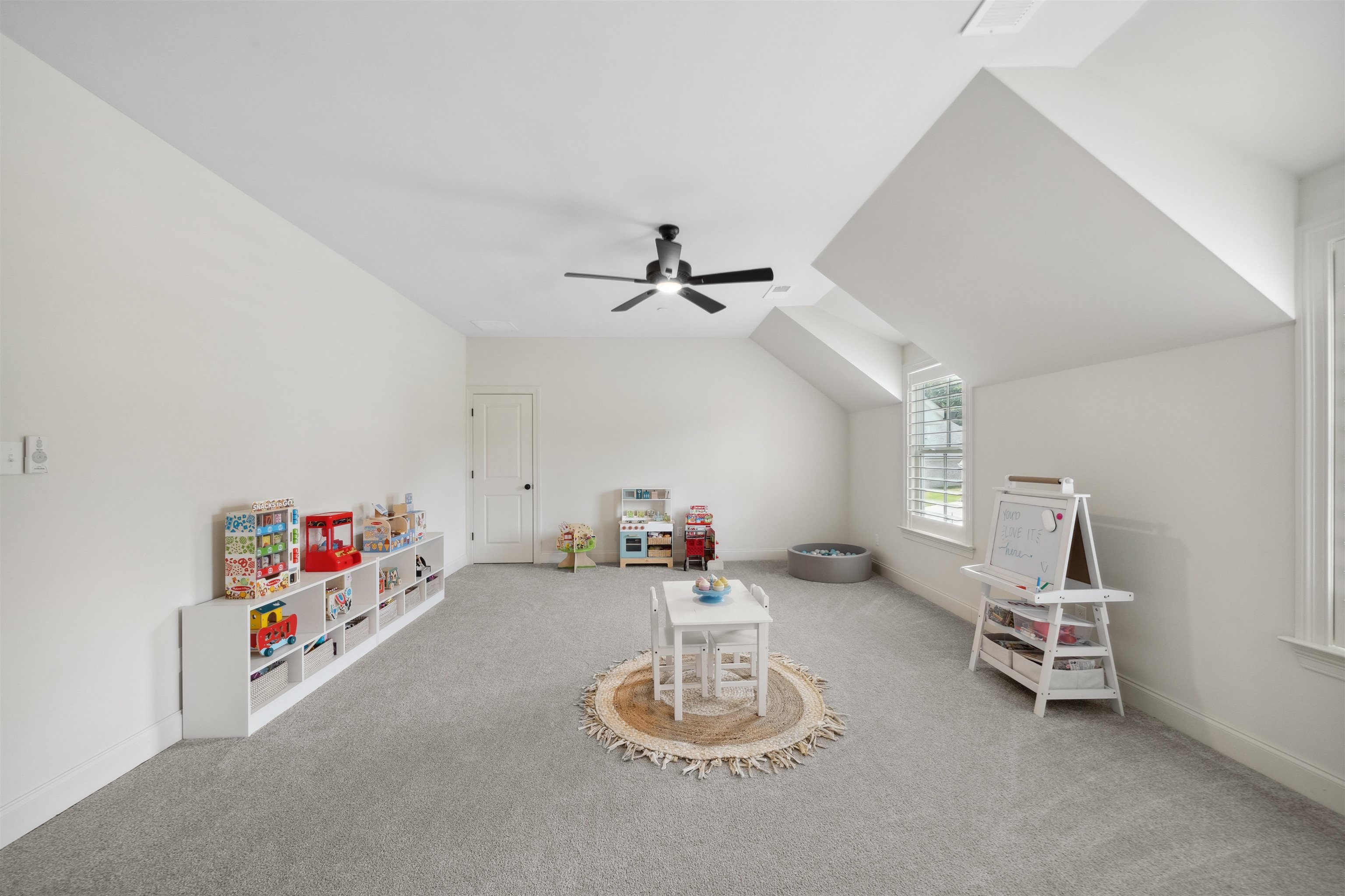 220 Mary Taylor Way Piperton, TN 38017 - Photo 26 of 36 Rec room with lofted ceiling, light carpet, and ceiling fan