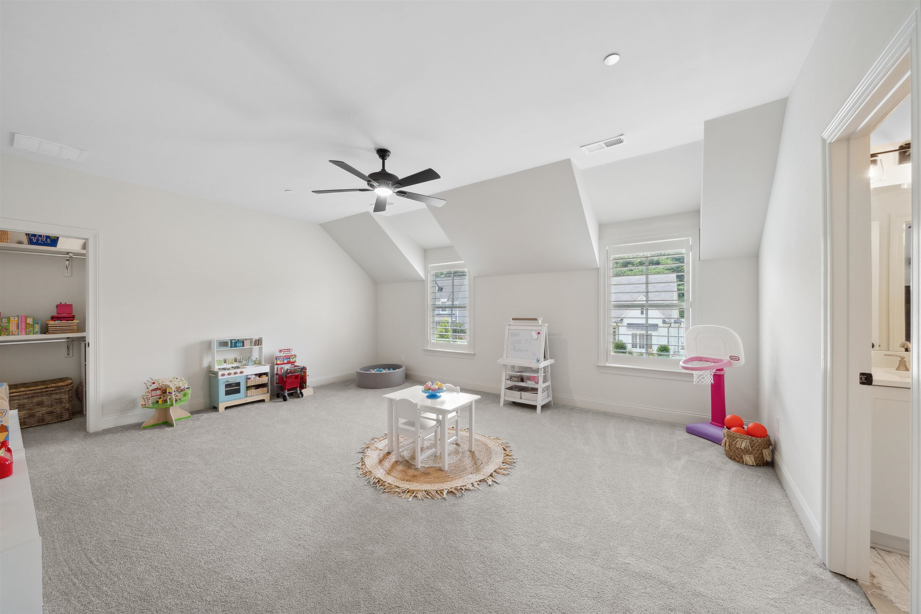 220 Mary Taylor Way Piperton, TN 38017 - Photo 27 of 36 Playroom featuring lofted ceiling, light colored carpet, and a ceiling fan