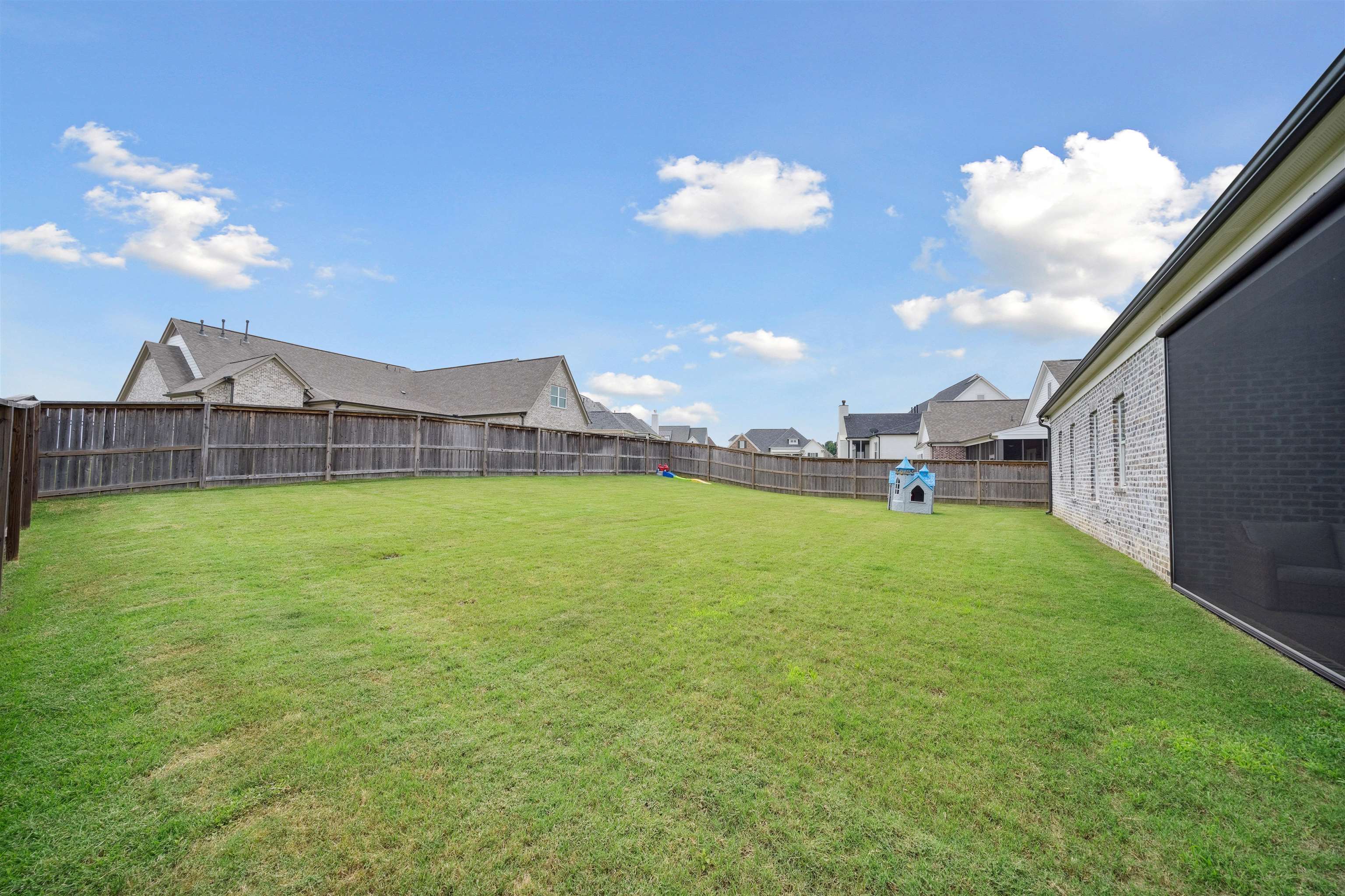220 Mary Taylor Way Piperton, TN 38017 - Photo 34 of 36 Fenced backyard featuring a residential view