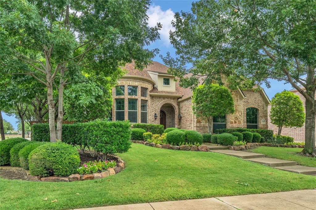 12698 Colborne Drive Frisco, TX 75033 - Photo 1 of 1 a front view of a house with a yard