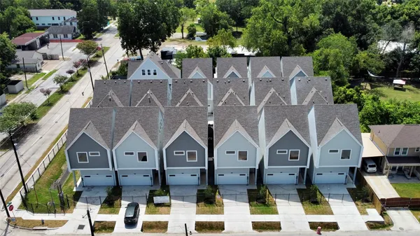 an aerial view of a house with a garden