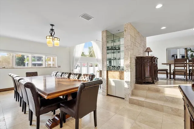a view of a hallway with seating area