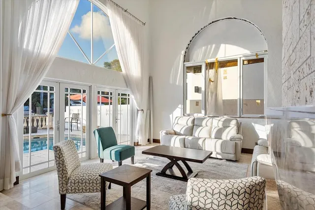 a bedroom with a bed and a tv