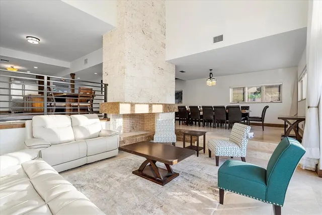 a bedroom with a bed and a table