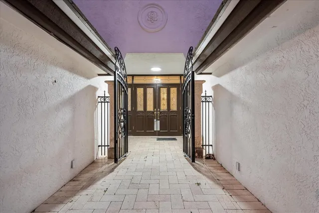 a view of a swimming pool with a patio