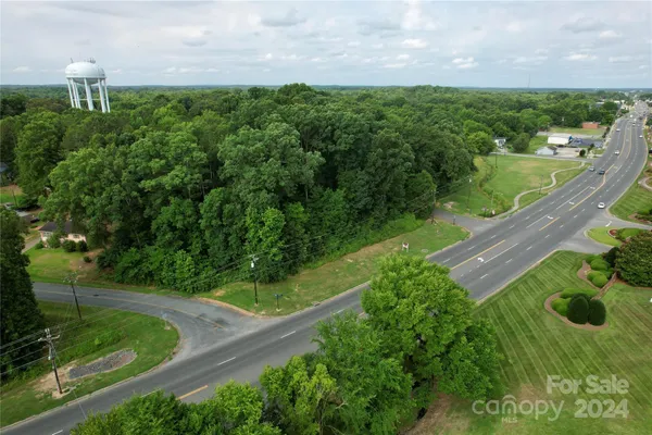 a view of a city street from a yard