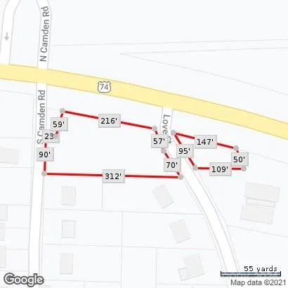 a view of a garden from a balcony