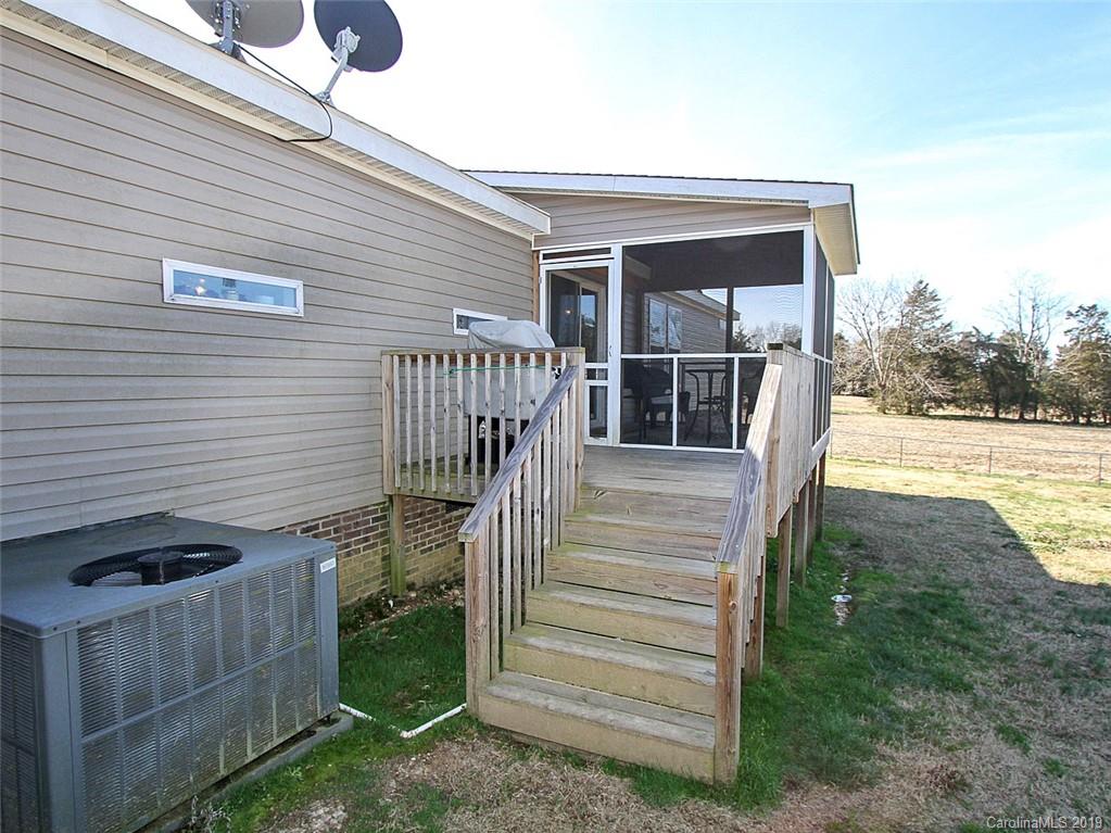 4027 Pink Plyler Road Lancaster, SC 29720 - Photo 11 of 34 a view of outdoor space and deck