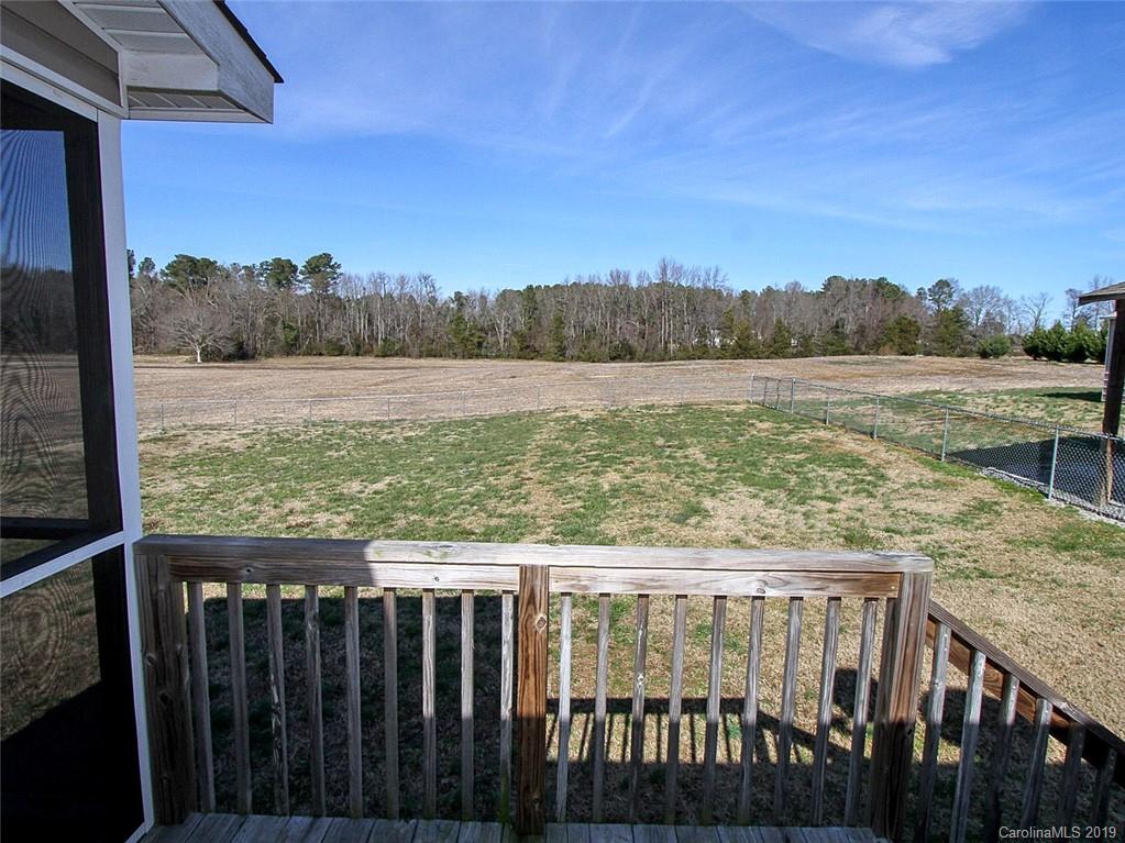 4027 Pink Plyler Road Lancaster, SC 29720 - Photo 12 of 34 a view of a lake from a balcony