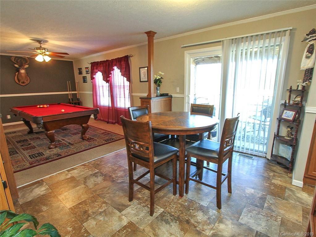 4027 Pink Plyler Road Lancaster, SC 29720 - Photo 25 of 34 a view of a dining room with furniture