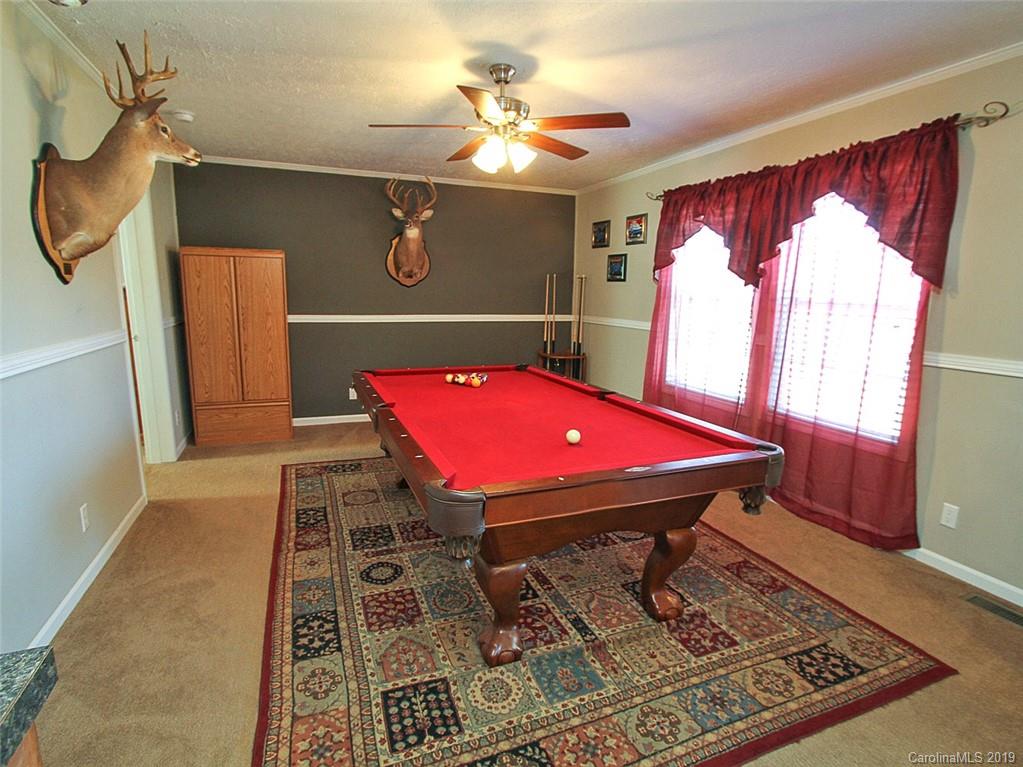4027 Pink Plyler Road Lancaster, SC 29720 - Photo 26 of 34 a room with pool table and windows
