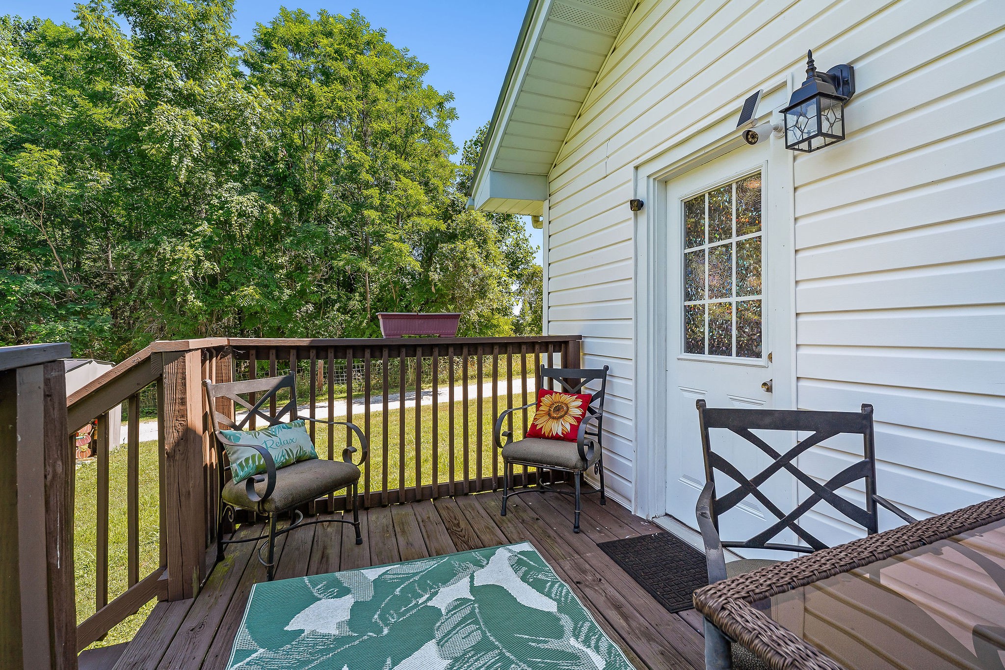 412 3rd Avenue North Baxter, TN 38544 - Photo 4 of 32 a balcony with wooden floor table and chairs