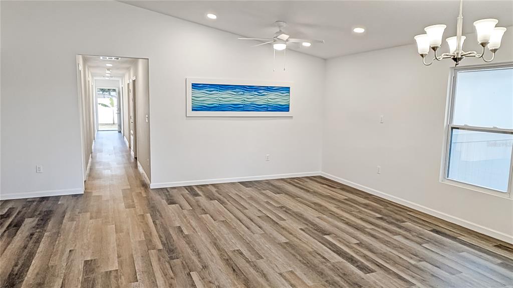 1040 20th Street Orlando, FL 32805 - Photo 10 of 33 a view of empty room with wooden floor