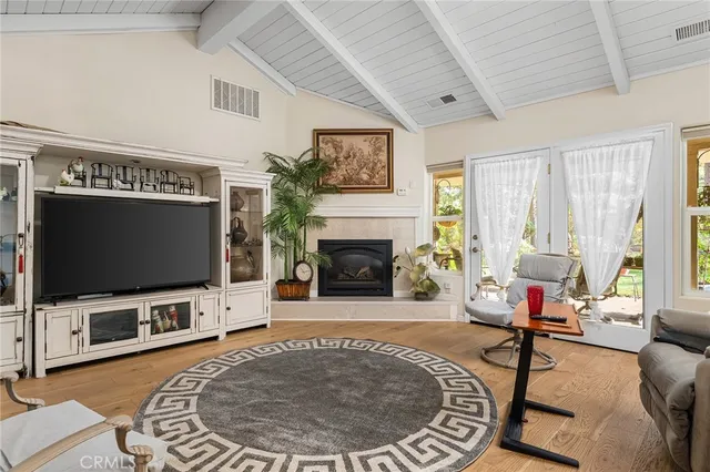 a kitchen with granite countertop a sink stove and cabinets