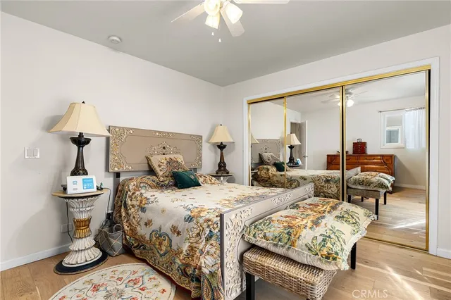 a bathroom with a sink vanity and a shower