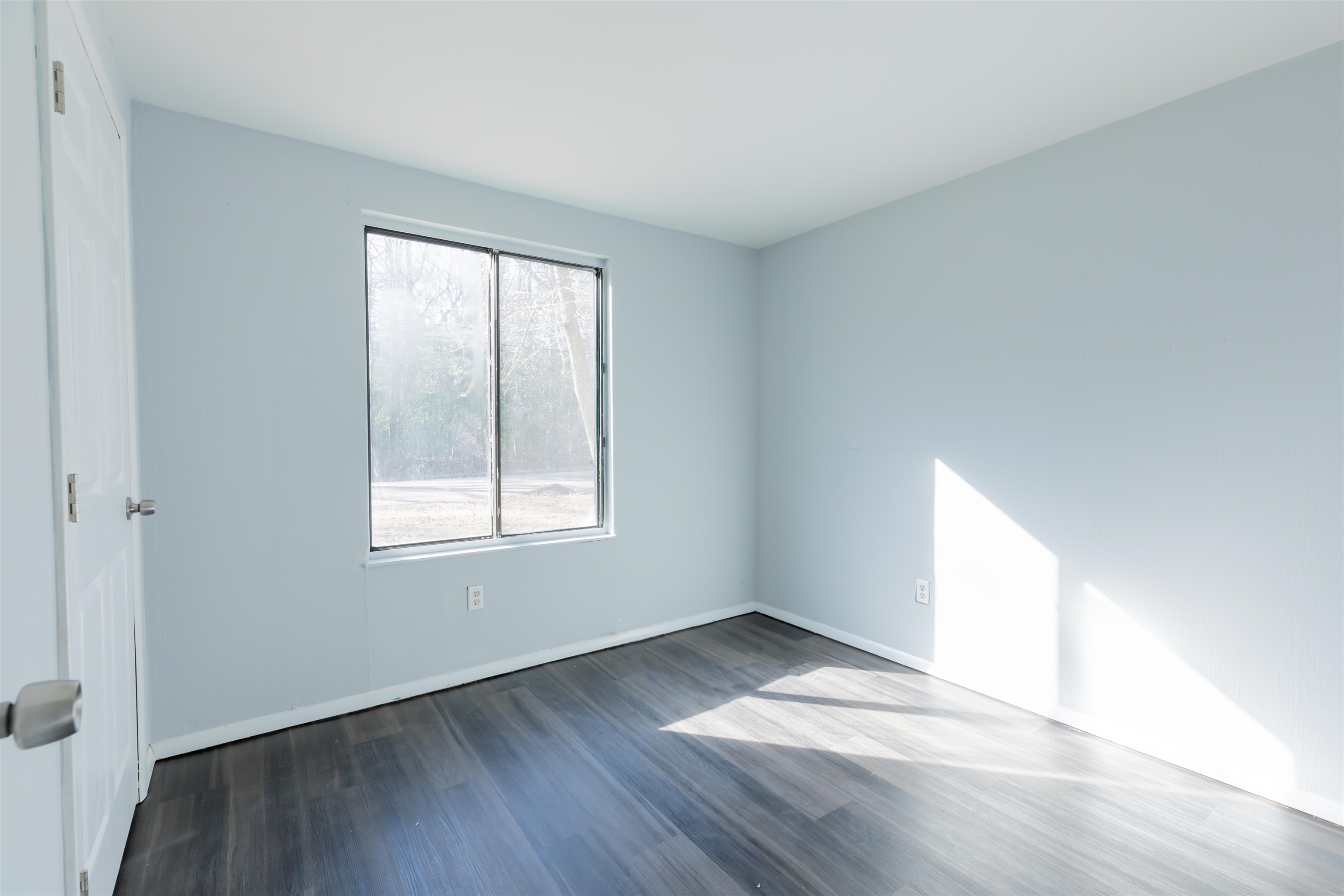 504 East Main Street Rio Grande, NJ 08242 - Photo 16 of 22 an empty room with wooden floor and windows
