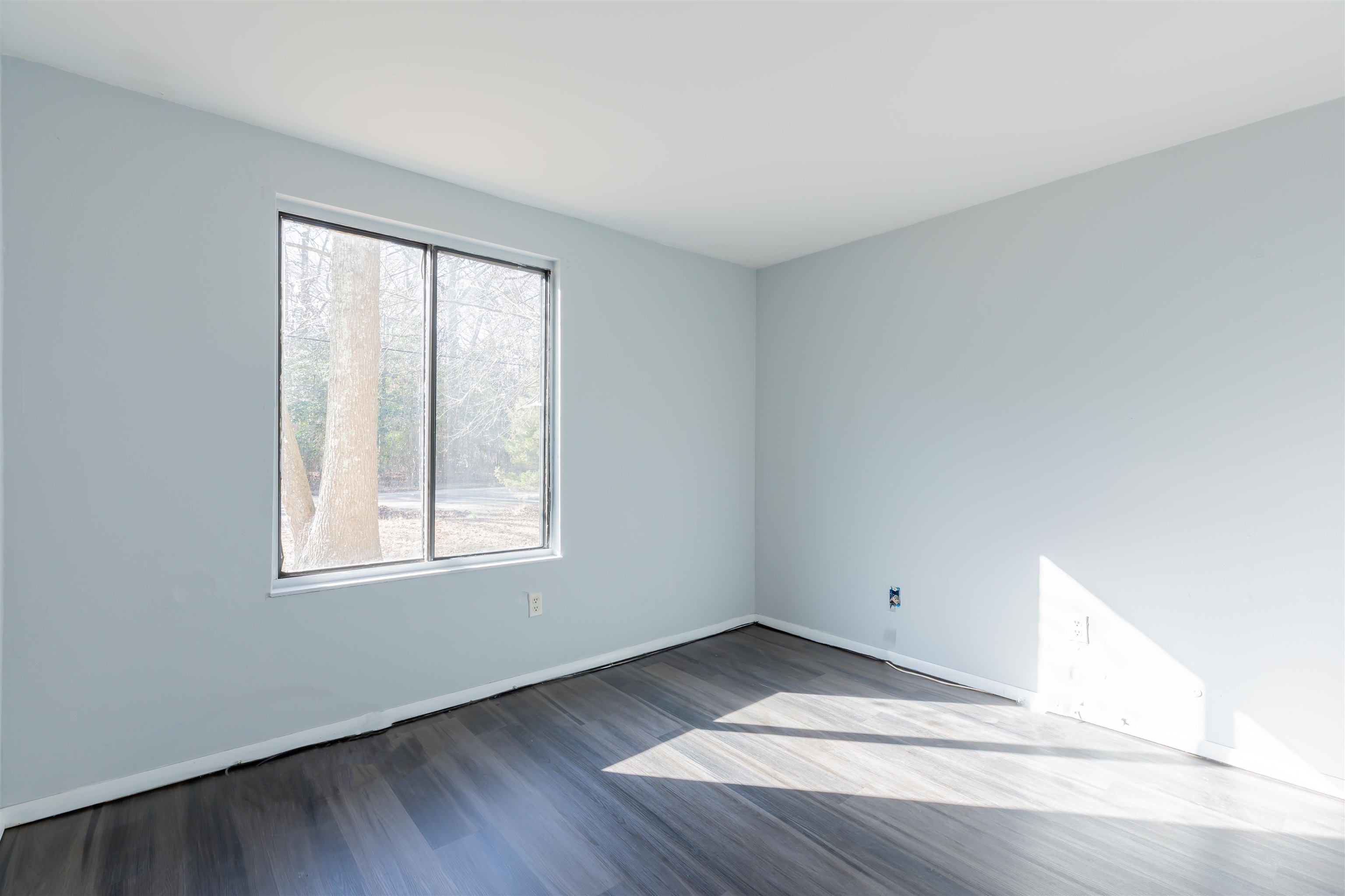 504 East Main Street Rio Grande, NJ 08242 - Photo 18 of 22 an empty room with wooden floor and windows