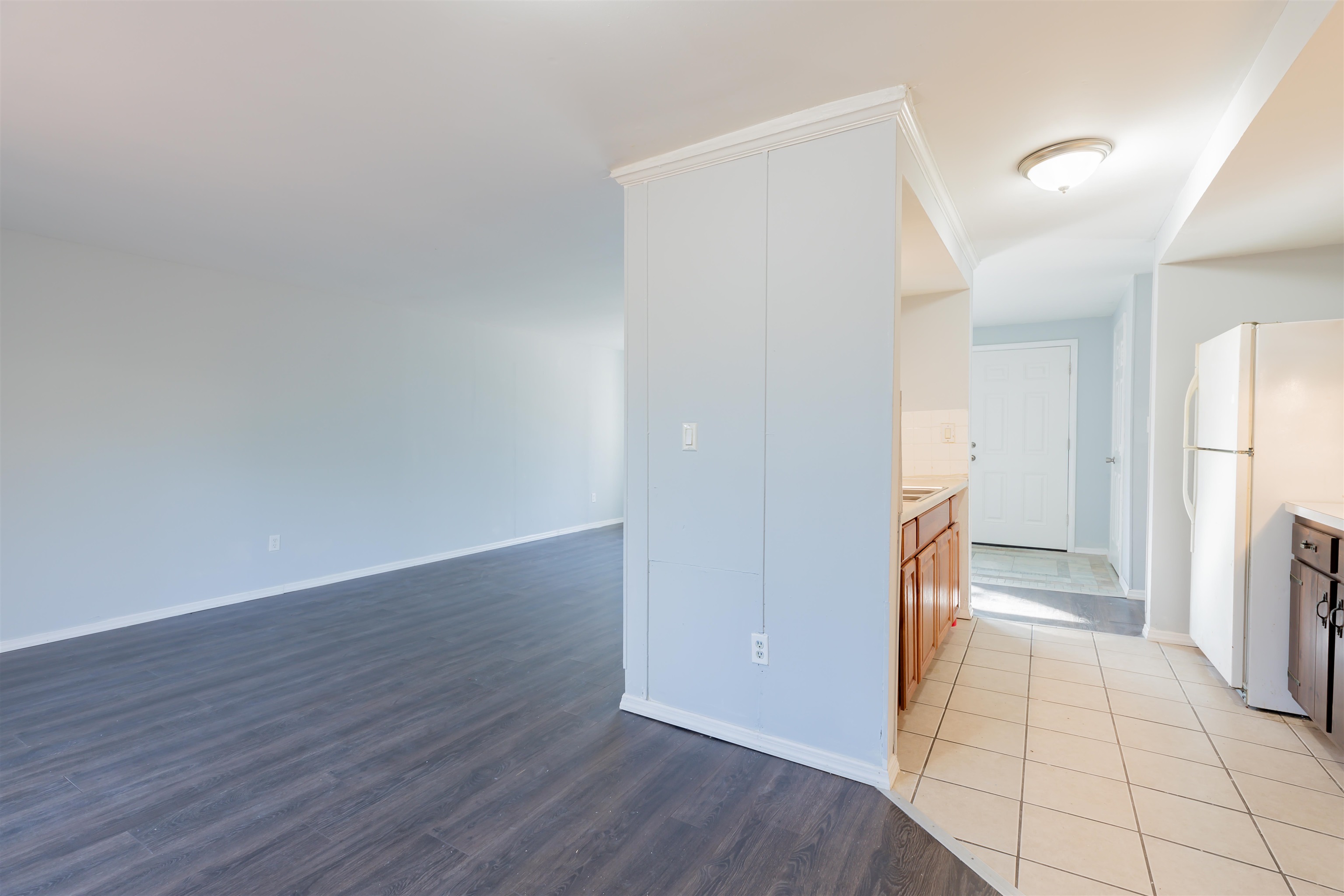 504 East Main Street Rio Grande, NJ 08242 - Photo 6 of 22 a view of a kitchen with refrigerator and an empty room