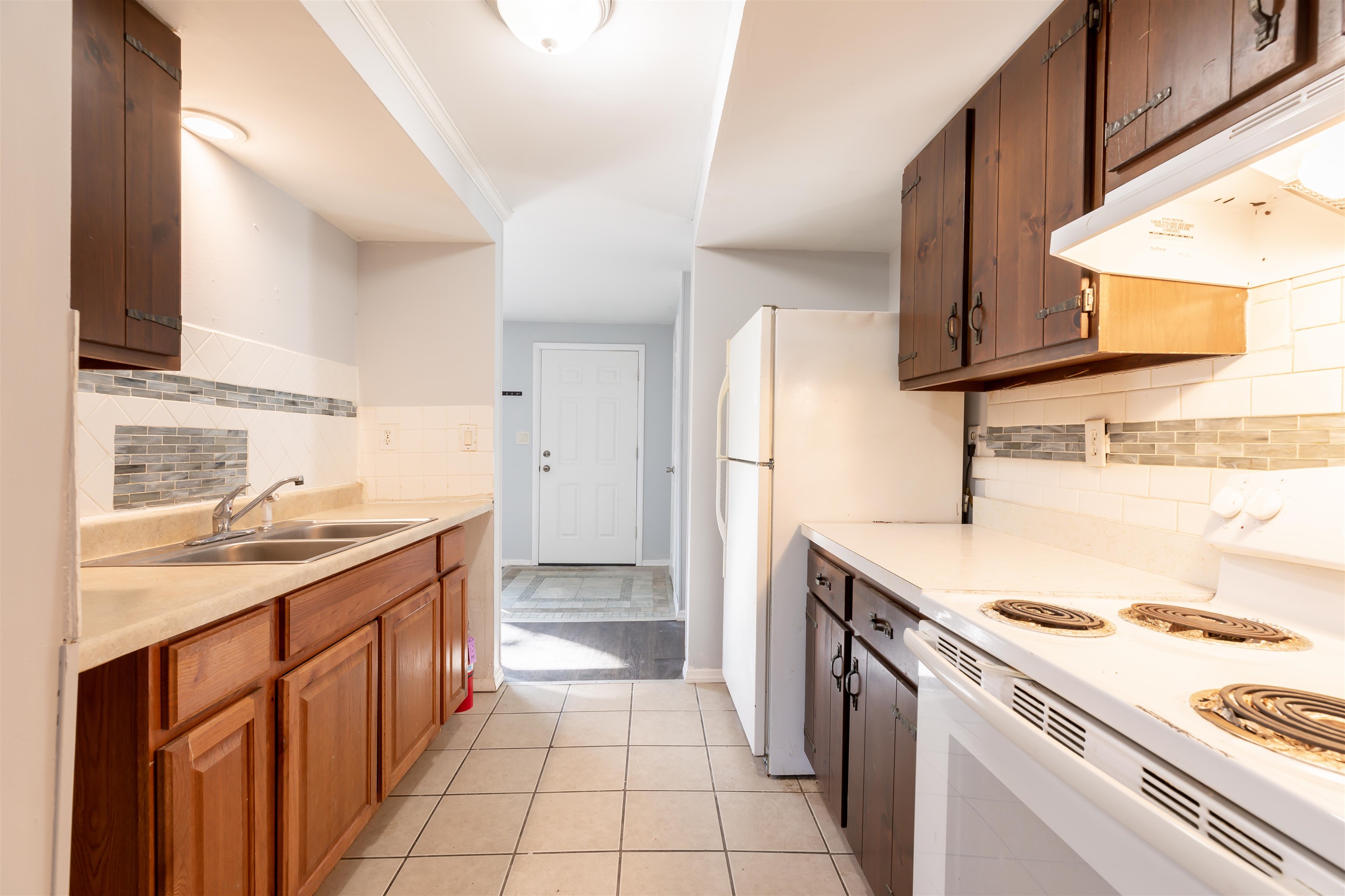 504 East Main Street Rio Grande, NJ 08242 - Photo 8 of 22 a kitchen with a sink stove and refrigerator