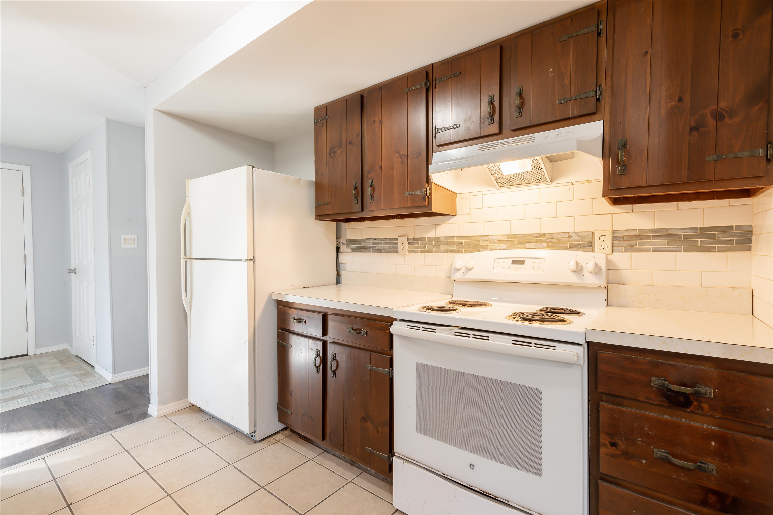 504 East Main Street Rio Grande, NJ 08242 - Photo 9 of 22 a kitchen with a sink stove and refrigerator