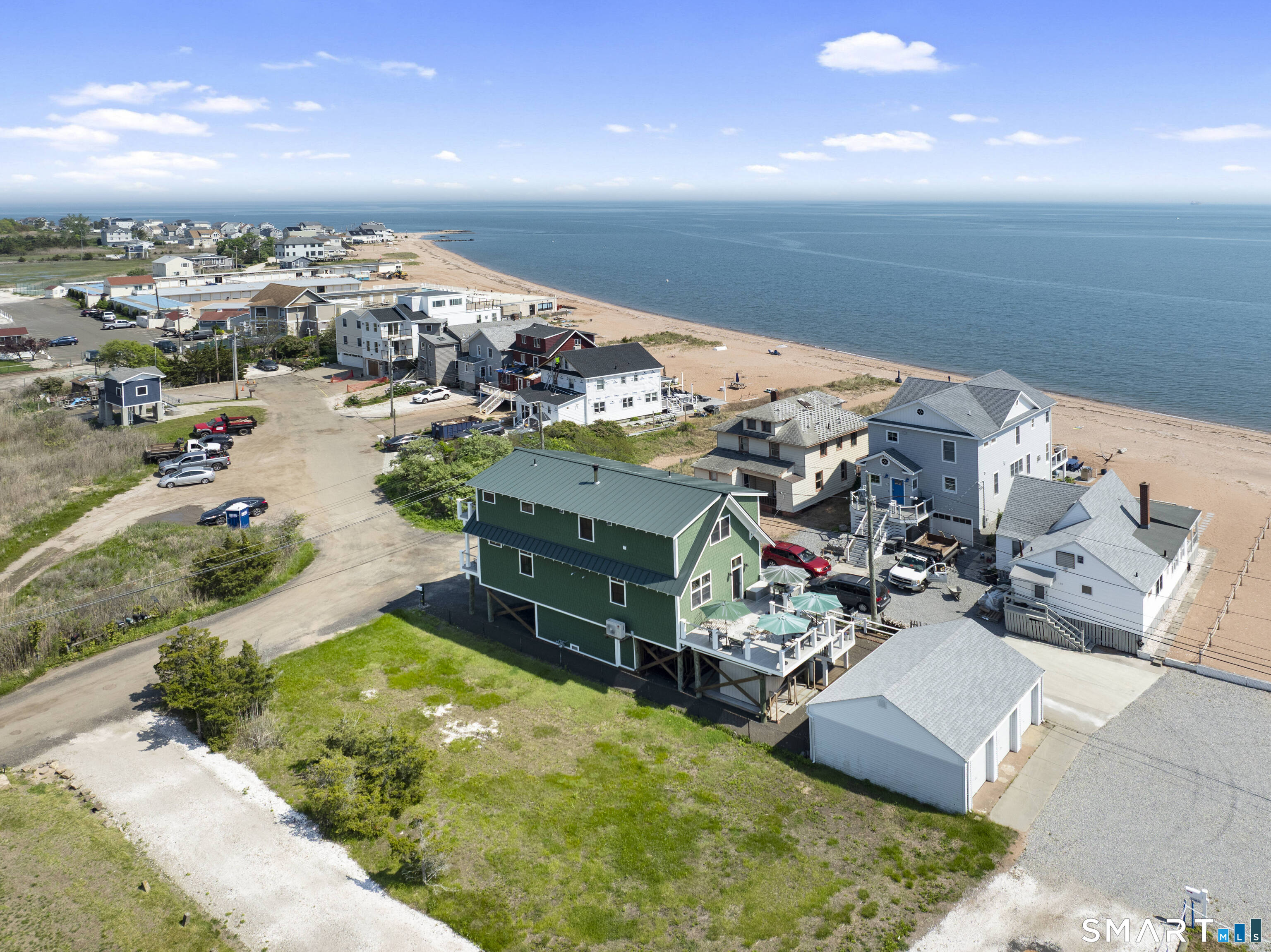 2 Minor Road East Haven, CT 06512 - Photo 5 of 36 an aerial view of a house with a ocean view