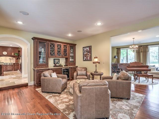 19 Russell Road Freehold, NJ 07728 - Photo 11 of 68 a living room with furniture and a wooden floor