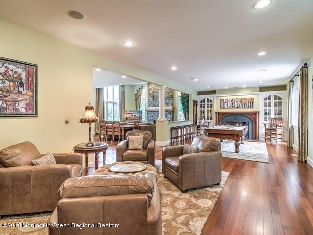 19 Russell Road Freehold, NJ 07728 - Photo 13 of 68 a living room with furniture and wooden floor