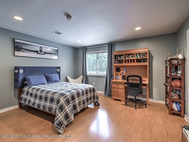 19 Russell Road Freehold, NJ 07728 - Photo 30 of 68 a bedroom with a bed and a desk