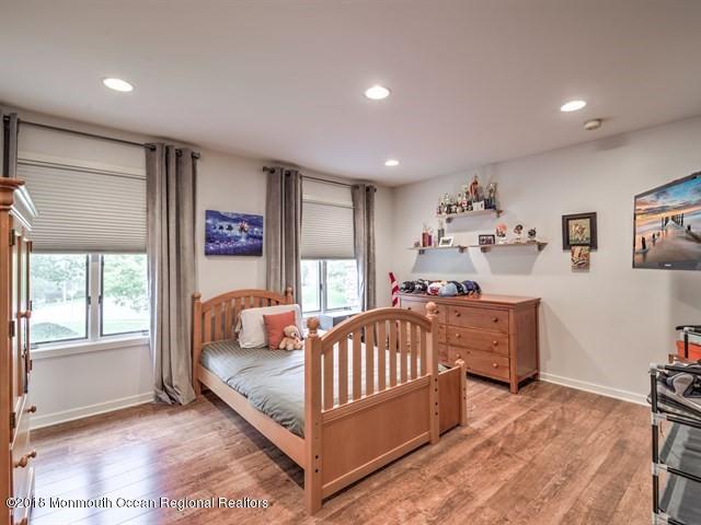 19 Russell Road Freehold, NJ 07728 - Photo 36 of 68 a bedroom with furniture and a window